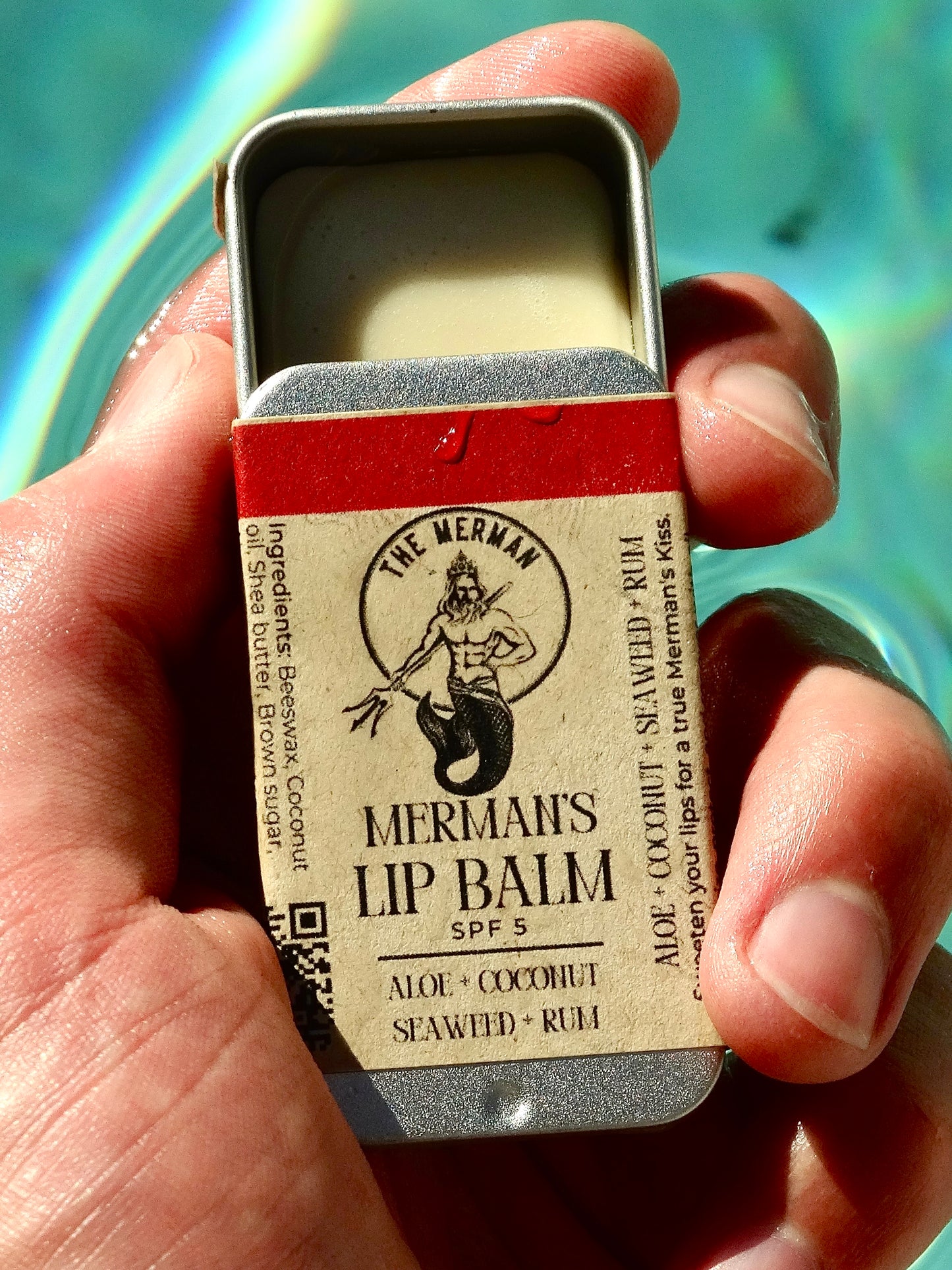 Lata de bálsamo labial de Merman