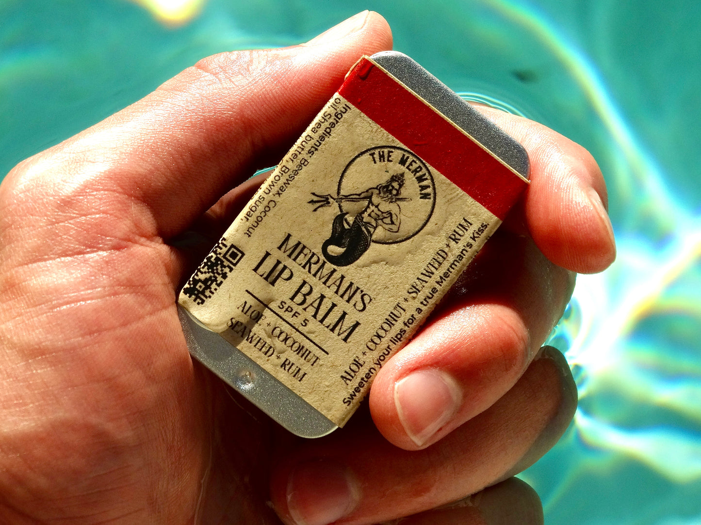Lata de bálsamo labial de Merman