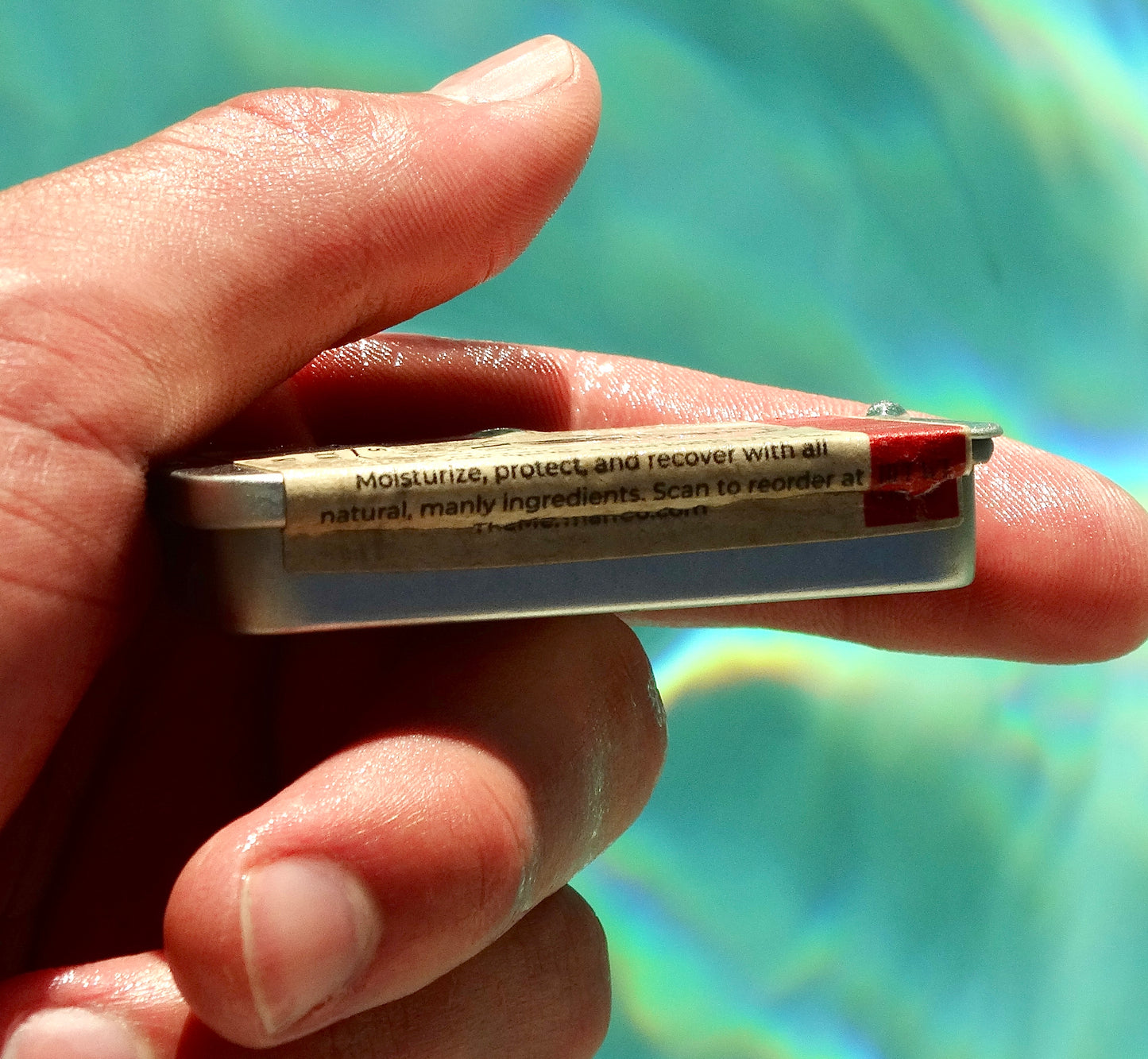 Lata de bálsamo labial de Merman